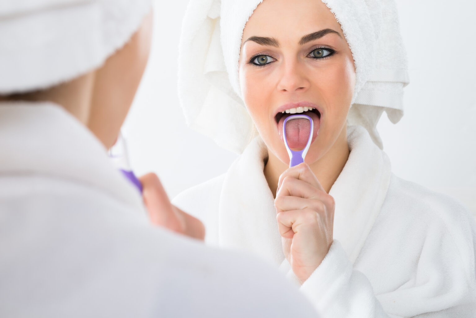 Should I Be Using a Tongue Scraper? Dentist in 68776